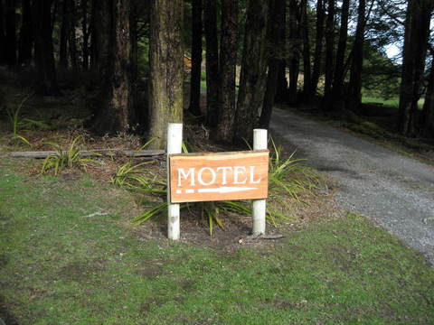 wooden motel signs